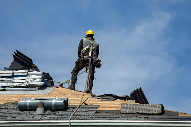 Professional Gutter Installation technician working in Oak Island, NC